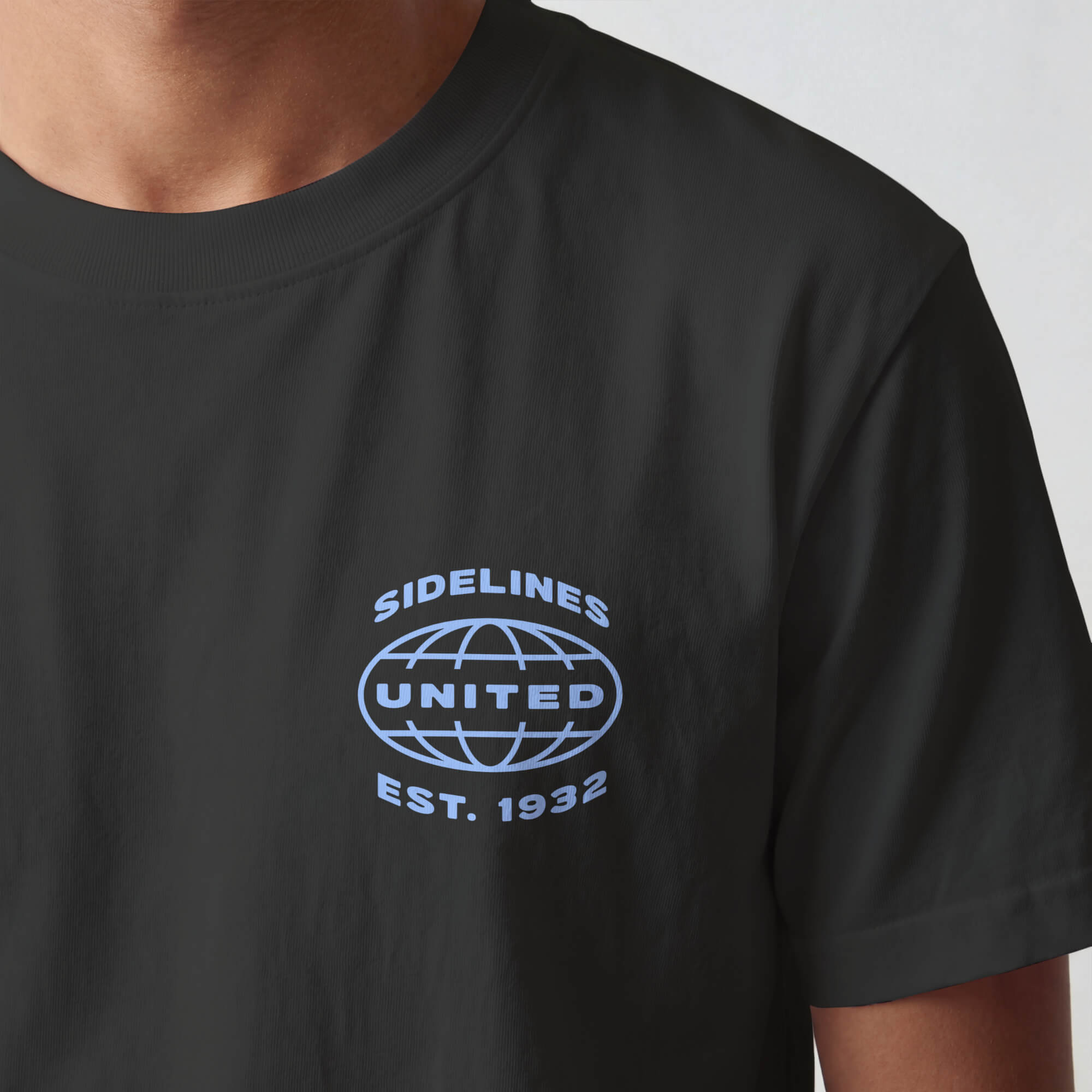SU front-hit mockup: Mock Ups - Front Hit Blue on Washed Black.jpg