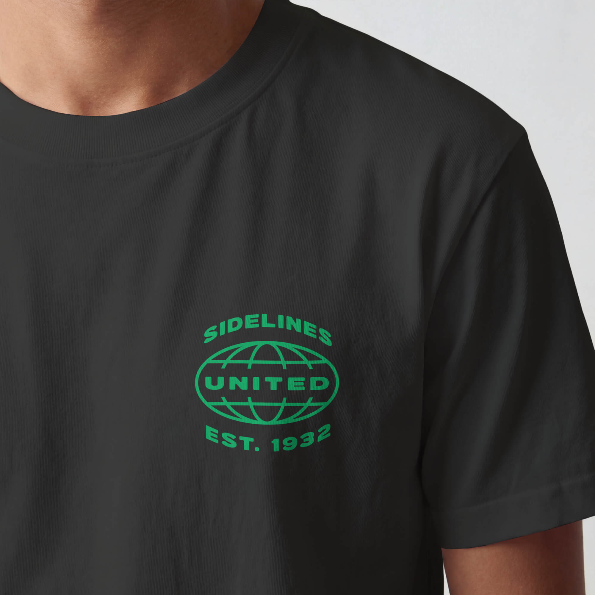 SU front-hit mockup: Mock Ups - Front Hit Green on Washed Black.jpg