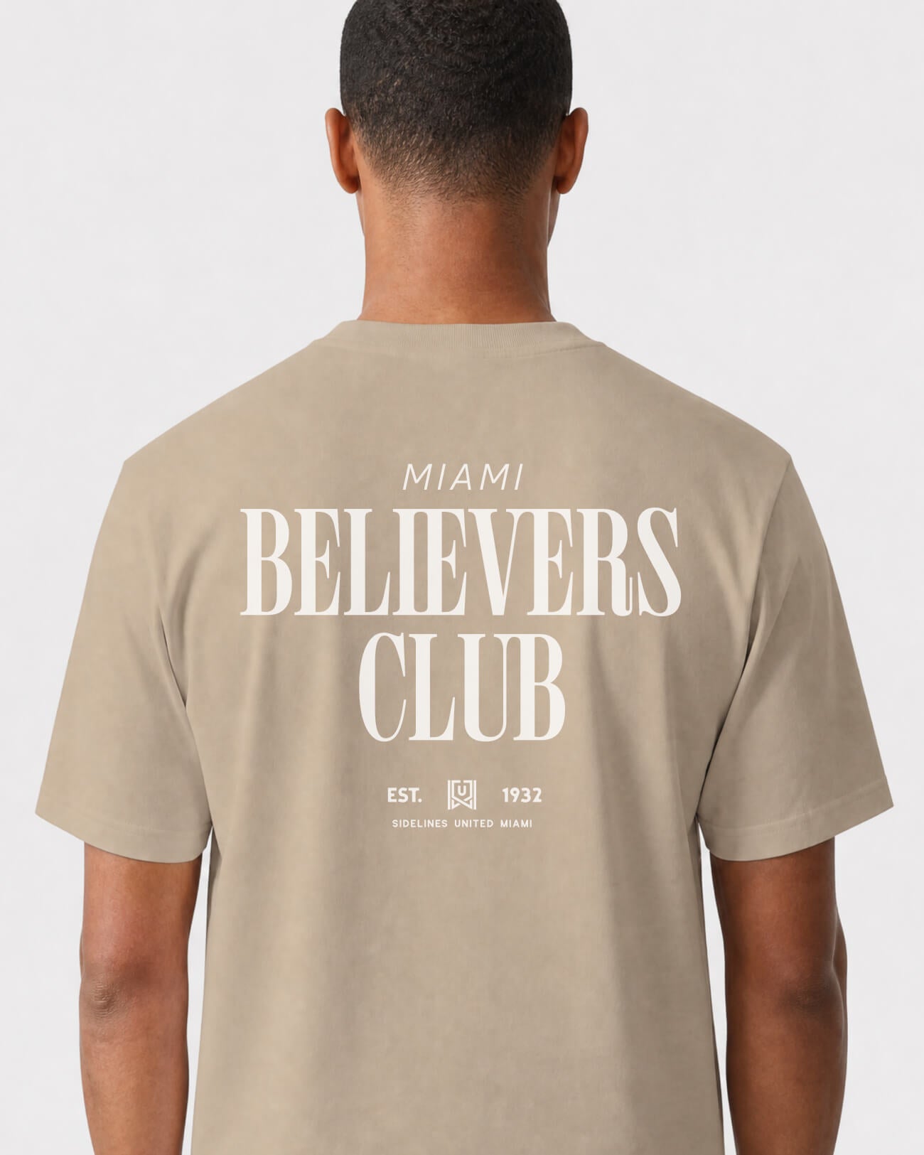 mockup-flatlay_T_Believers-Club---All-Sports_Miami_FL_All-Teams_Light-On-Khaki_rel-20260602_id-6ZKDUYI.jpg