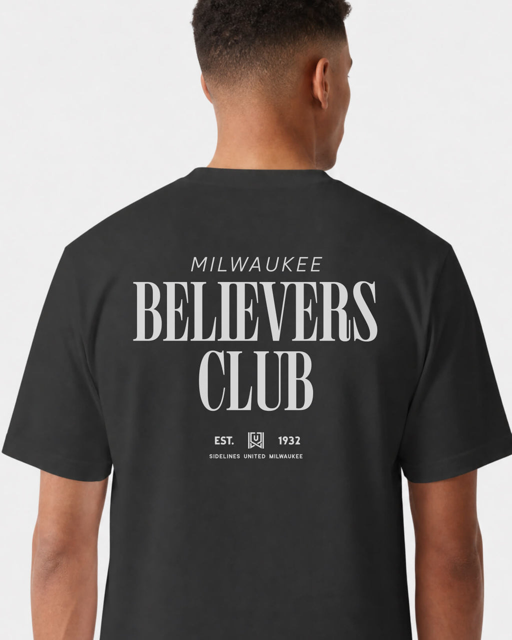 mockup-flatlay_T_Believers-Club---All-Sports_Milwaukee_WI_All-Teams_Light-On-Washed-Black_rel-20260602_id-QXFRNET.jpg