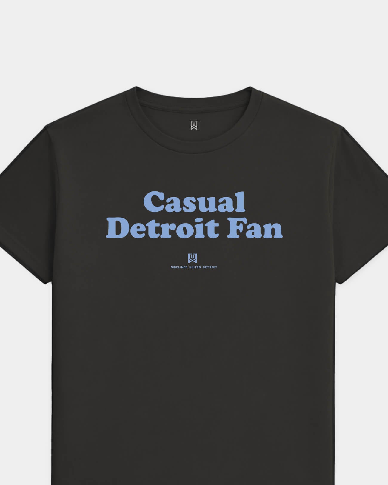 mockup-flatlay_T_Casual-Fan---All-Sports_Detroit_MI_Pistons_Team-On-Washed-Black_rel-20260602_id-BI1G4H7.jpg