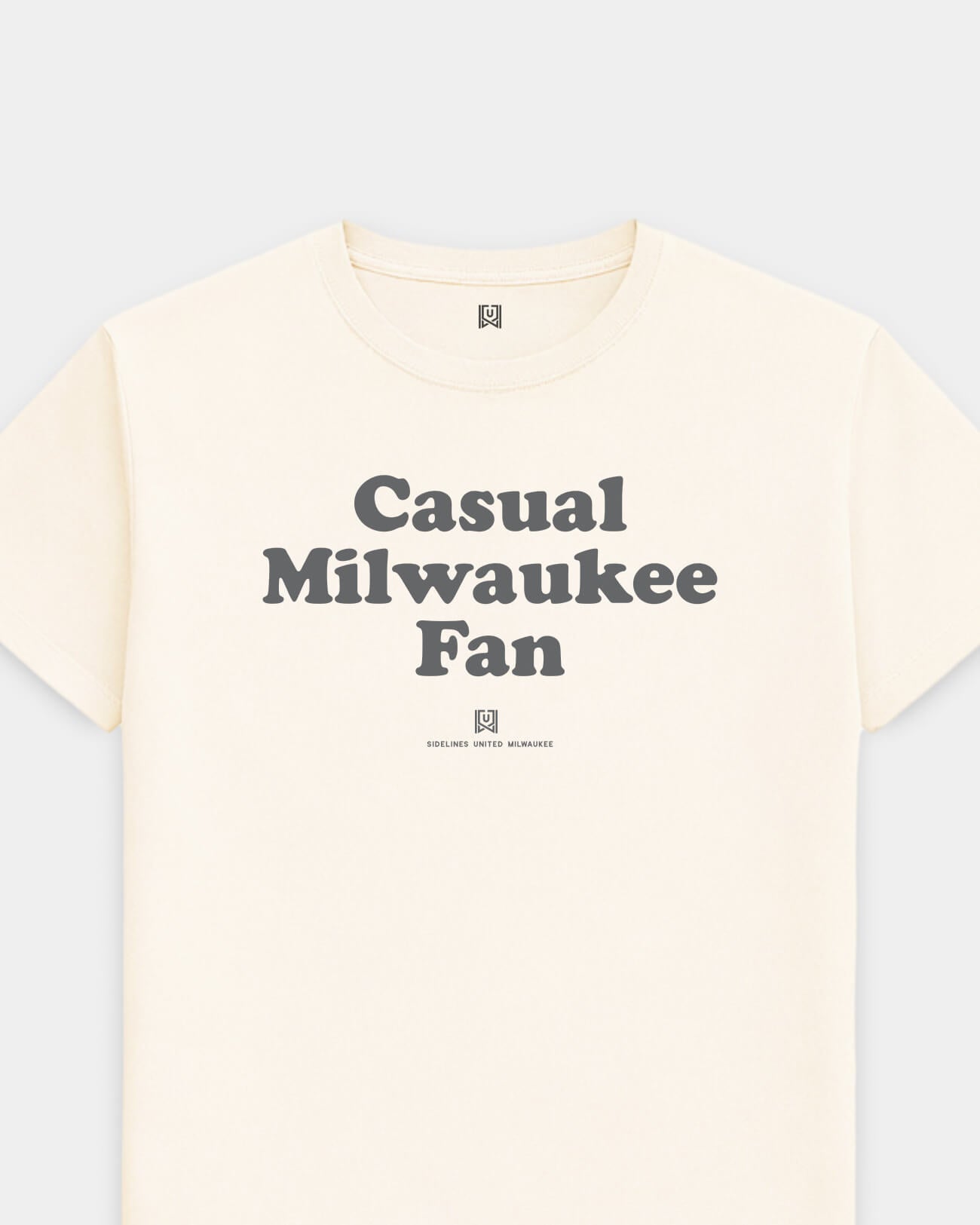 mockup-flatlay_T_Casual-Fan---All-Sports_Milwaukee_WI_All-Teams_Dark-On-Vintage-White_rel-20260602_id-NKLKLHY.jpg