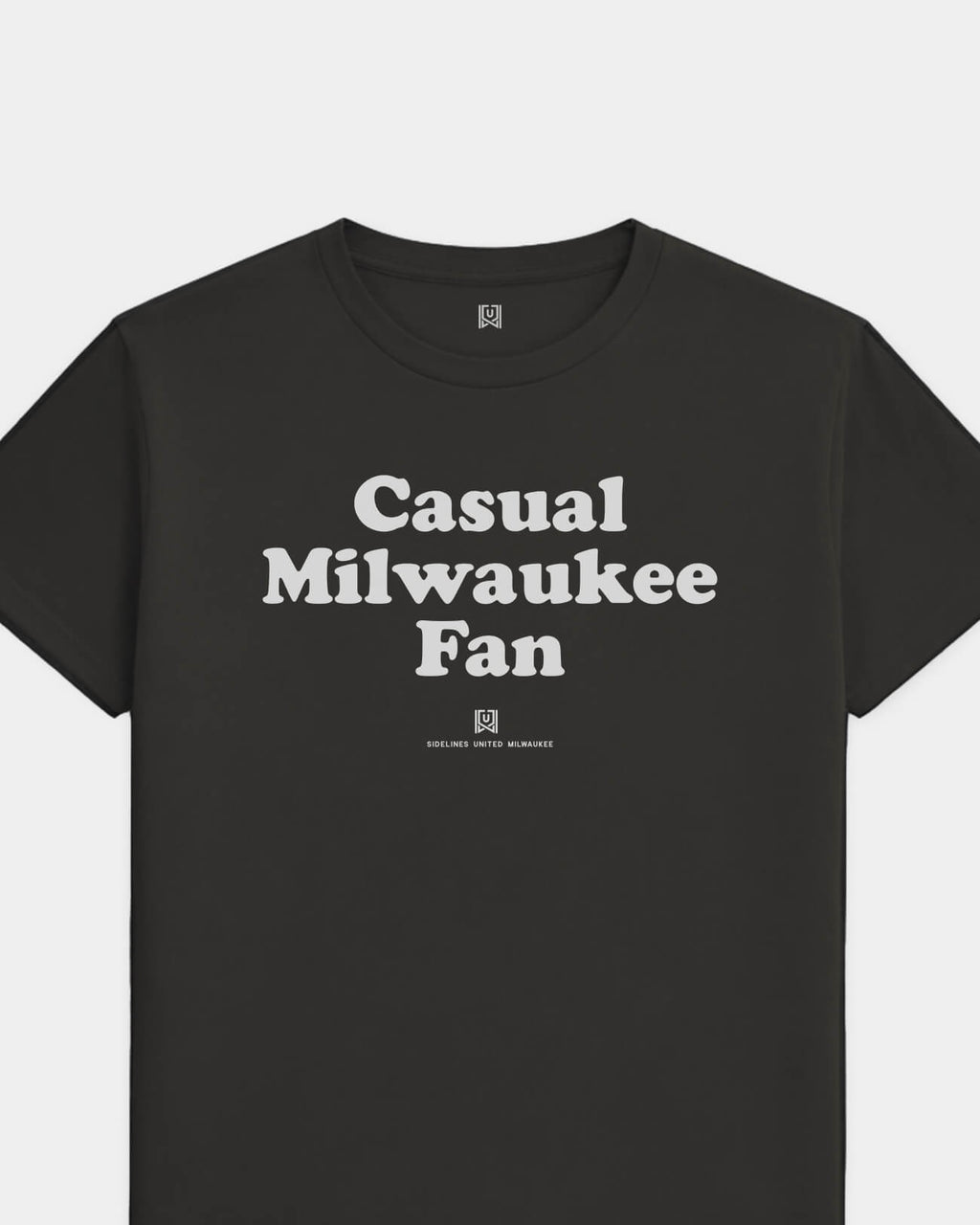 mockup-flatlay_T_Casual-Fan---All-Sports_Milwaukee_WI_All-Teams_Light-On-Washed-Black_rel-20260602_id-NIUISSH.jpg