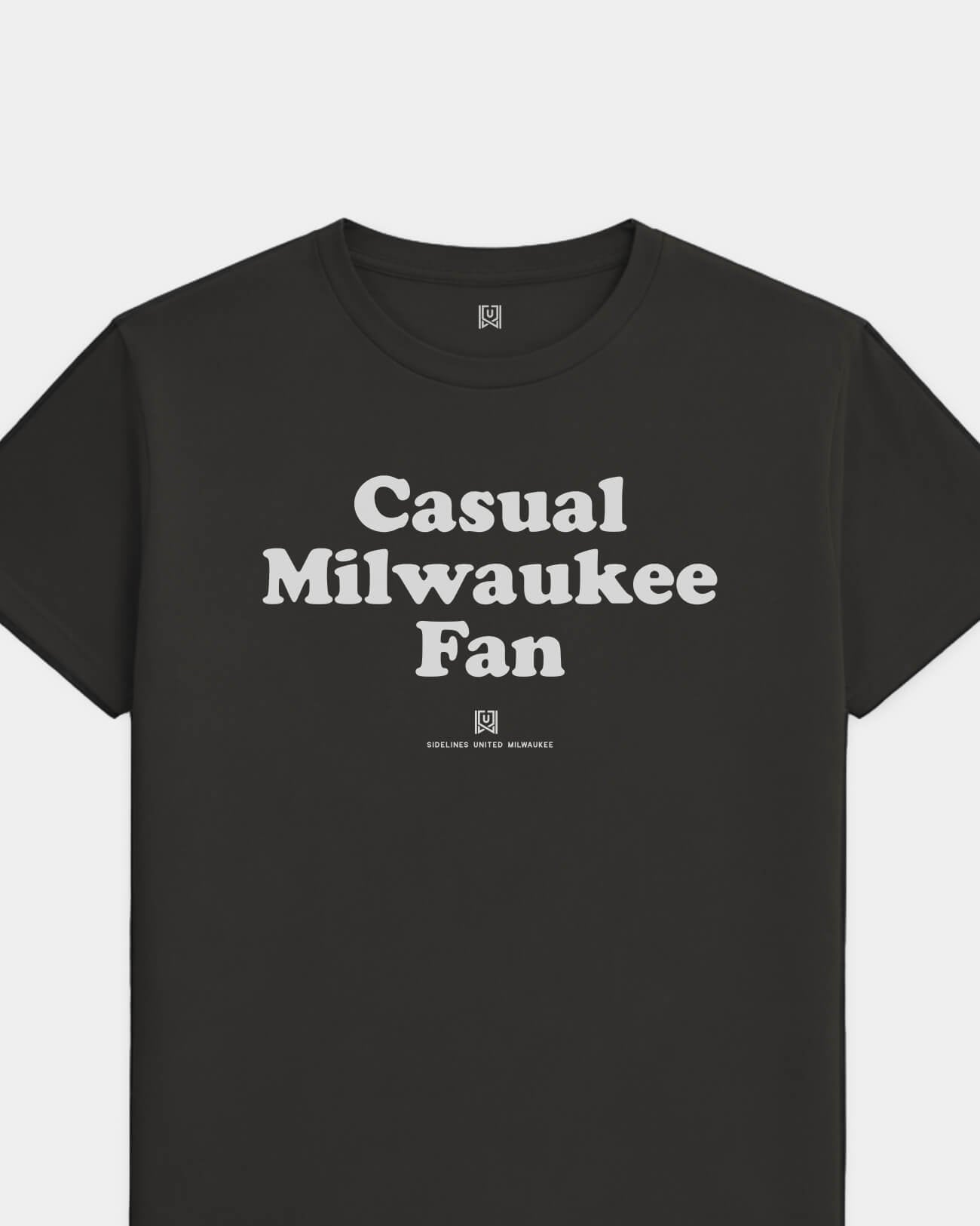 mockup-flatlay_T_Casual-Fan---All-Sports_Milwaukee_WI_All-Teams_Light-On-Washed-Black_rel-20260602_id-NIUISSH.jpg