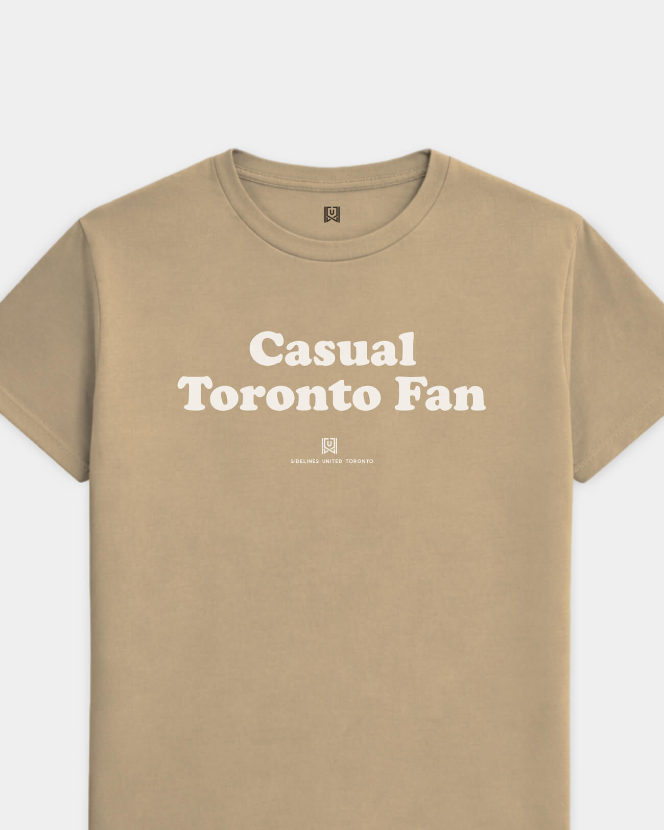 mockup-flatlay_T_Casual-Fan---All-Sports_Toronto_CAN_All-Teams_Light-On-Khaki_rel-20260602_id-LVASW8C.jpg