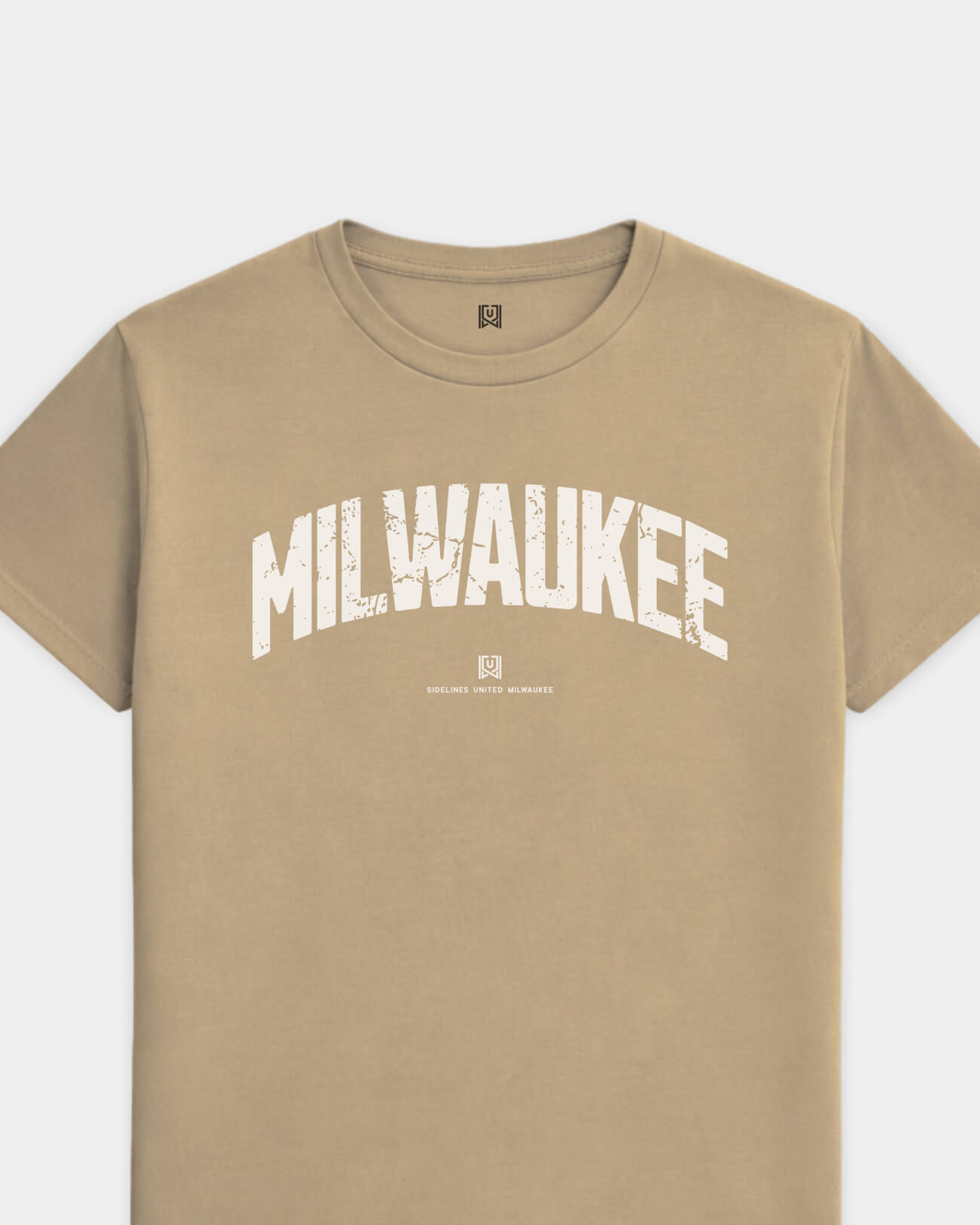 mockup-flatlay_T_Foundations---All-Sports_Milwaukee_WI_All-Teams_Light-On-Khaki_rel-20260602_id-7W081CL.jpg