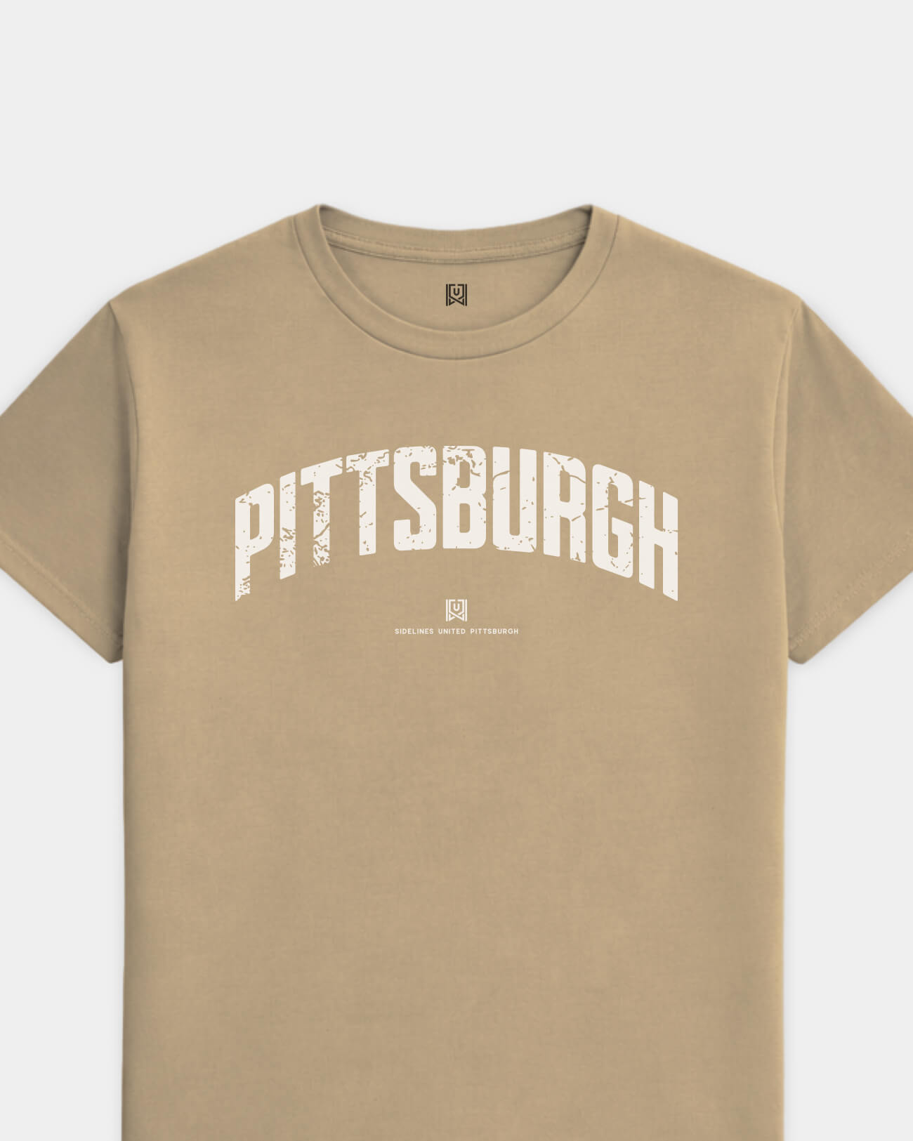 mockup-flatlay_T_Foundations---All-Sports_Pittsburgh_PA_All-Teams_Light-On-Khaki_rel-20260602_id-NVNTH0E.jpg