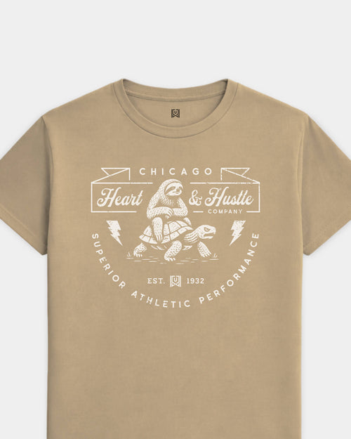 mockup-flatlay_T_Heart-and-Hustle---All-Sports_Chicago_IL_All-Teams_Light-On-Khaki_rel-20260602_id-49PJO76.jpg