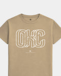 mockup-flatlay_T_Intersect---All-Sports_Oklahoma-City_OK_All-Teams_Light-On-Khaki_rel-20260602_id-CZA4I0D.jpg