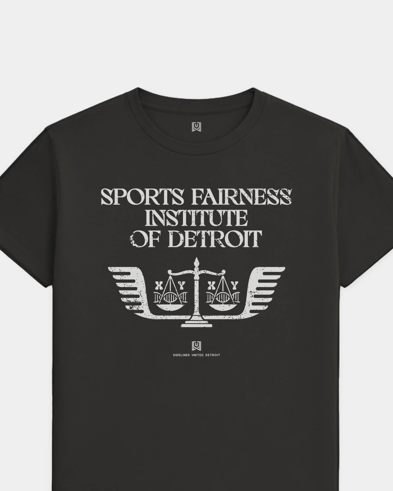mockup-flatlay_T_Sports-Fairness-Institute---All-Sports_Detroit_MI_All-Teams_Light-On-Washed-Black_rel-20260602_id-MWVG9OO.jpg