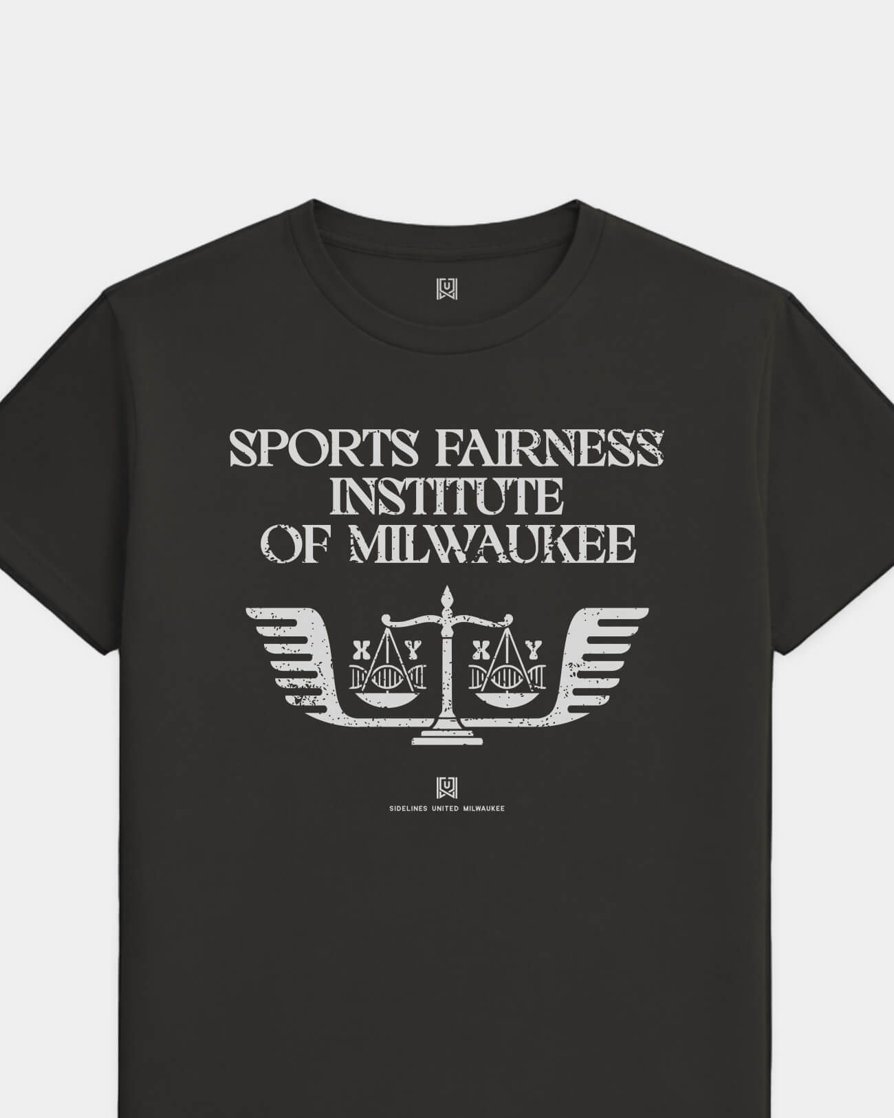 mockup-flatlay_T_Sports-Fairness-Institute---All-Sports_Milwaukee_WI_All-Teams_Light-On-Washed-Black_rel-20260602_id-SBVNYDF.jpg