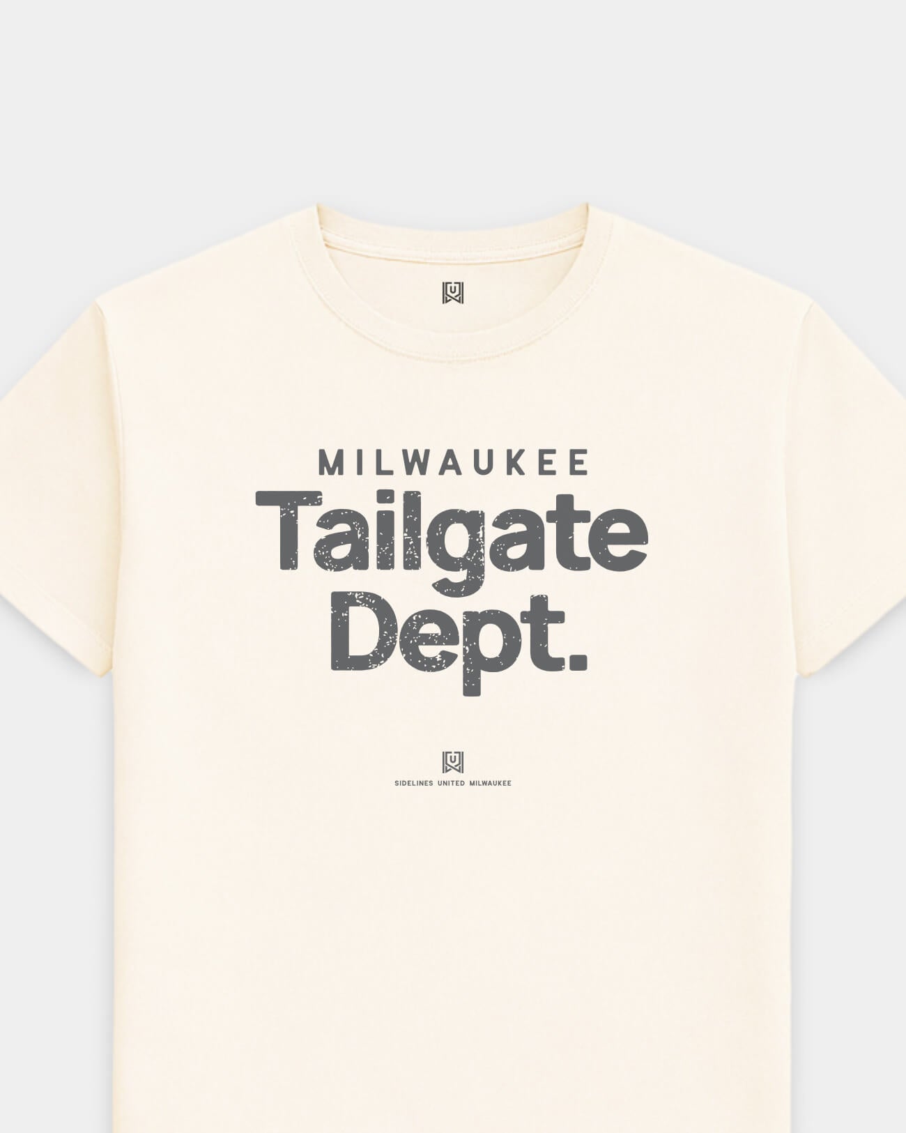 mockup-flatlay_T_Tailgate-Dept---All-Sports_Milwaukee_WI_All-Teams_Dark-On-Vintage-White_rel-20260602_id-JUA9CQ6.jpg