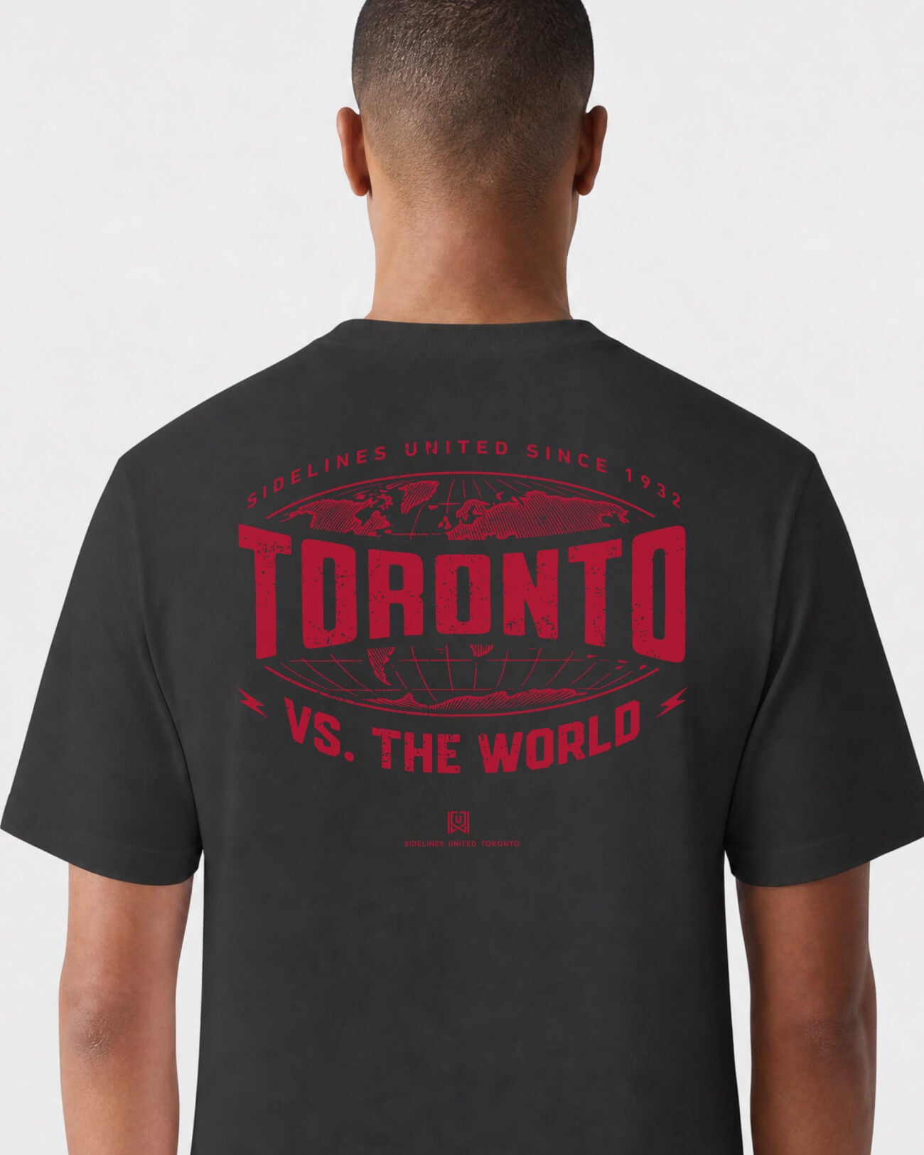 mockup-flatlay_T_VS-the-World-Atlas---All-Sports_Toronto_CAN_Raptors_Team-On-Washed-Black_rel-20260602_id-GSNASTS.jpg