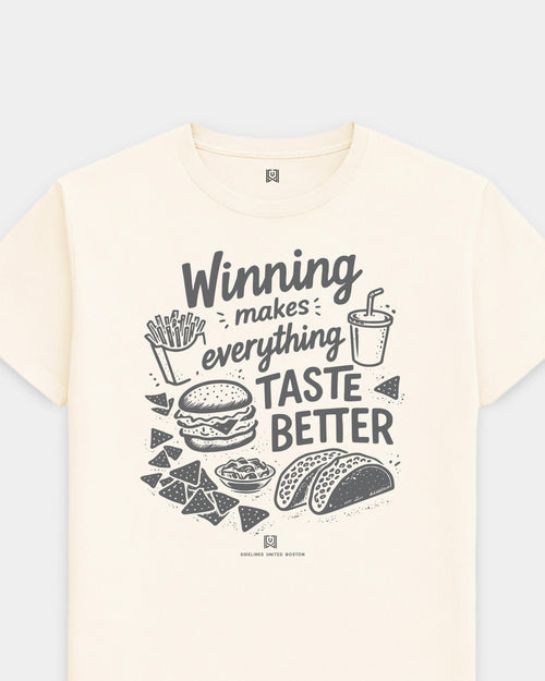 mockup-flatlay_T_Winning-Tastes-Better---All-Sports_Boston_MA_All-Teams_Dark-On-Vintage-White_rel-20260602_id-5UG63RY.jpg