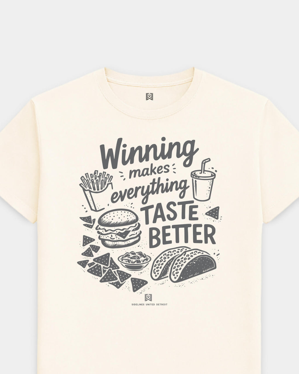 mockup-flatlay_T_Winning-Tastes-Better---All-Sports_Detroit_MI_All-Teams_Dark-On-Vintage-White_rel-20260602_id-MITAY0T.jpg